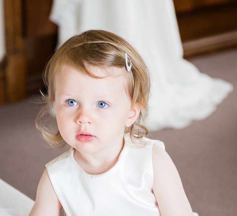 Flower Girl in Dessy Dress with Pale Green Sash | Turner & Moss Photography