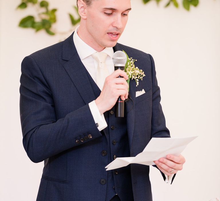 Groom in Navy Reiss Suit | Turner & Moss Photography