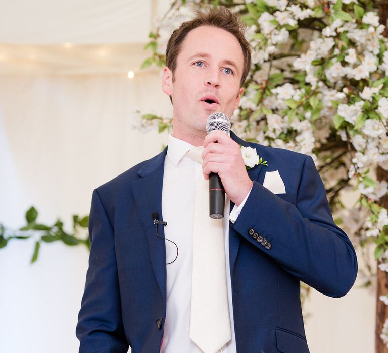 Groom in Navy Reiss Suit | Turner & Moss Photography