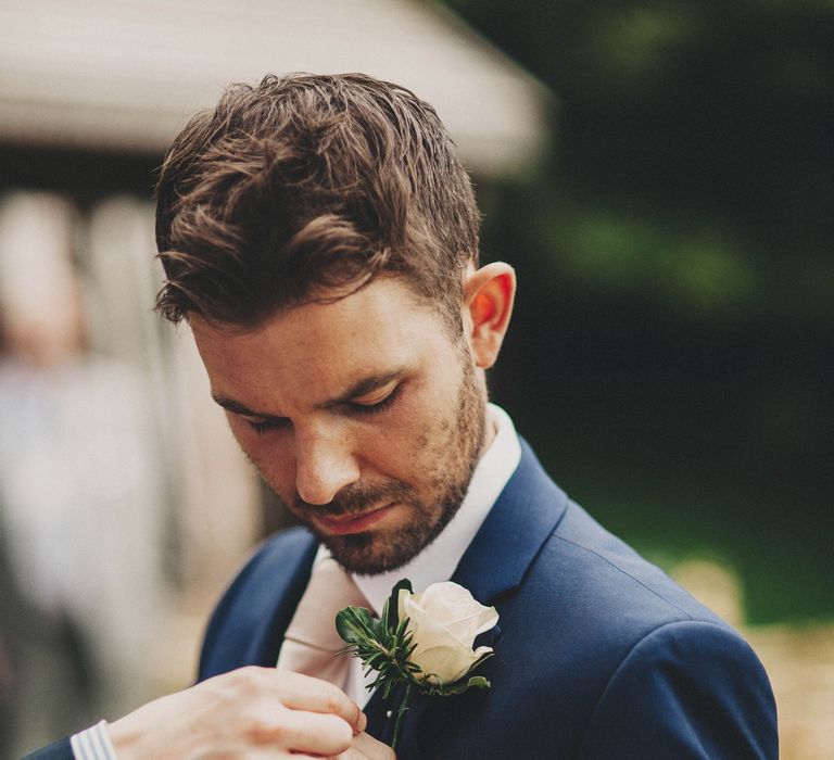 Groom in Ted Baker Suit