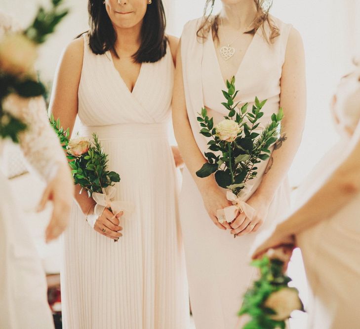 Bridesmaids in Blush Dresses & Single Stem Bouquet