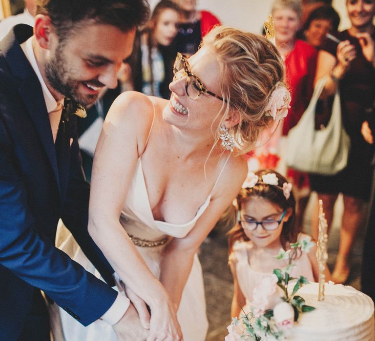 Bride & Groom Cutting the Cake