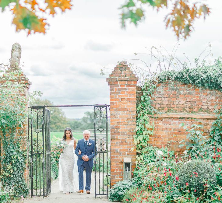 Bridal Entrance in Lace Gown from Blackburn Bridal | Elegant Pastel Wedding at Gaynes Park, Essex | White Stag Wedding Photography | At Motion Film