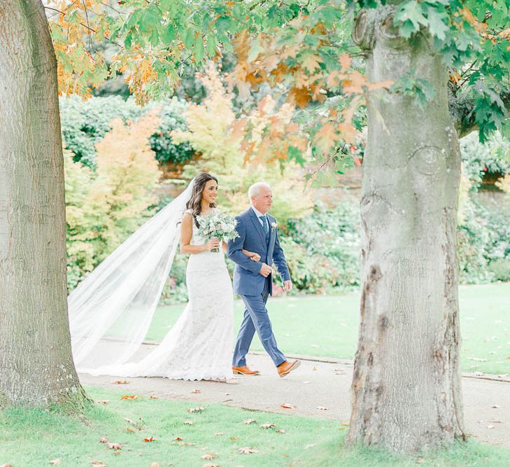 Bridal Entrance in Lace Gown from Blackburn Bridal | Elegant Pastel Wedding at Gaynes Park, Essex | White Stag Wedding Photography | At Motion Film