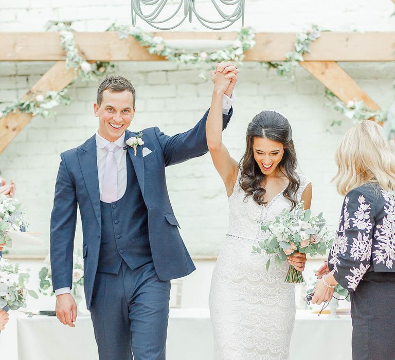 Wedding Ceremony | Bride in Lace Gown from Blackburn Bridal | Groom in Navy Three-piece Suit | Elegant Pastel Wedding at Gaynes Park, Essex | White Stag Wedding Photography | At Motion Film