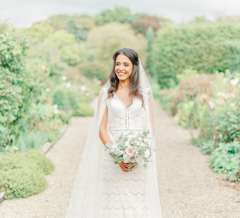 Bride in Lace Gown from Blackburn Bridal | Elegant Pastel Wedding at Gaynes Park, Essex | White Stag Wedding Photography | At Motion Film