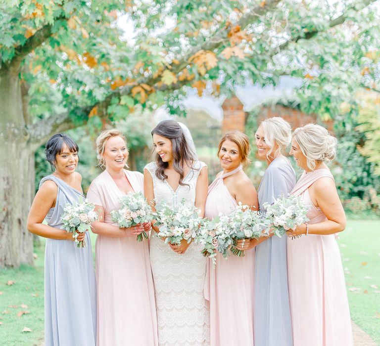 Bridesmaids in Grey & Pink Multiway Dresses | Elegant Pastel Wedding at Gaynes Park, Essex | White Stag Wedding Photography | At Motion Film