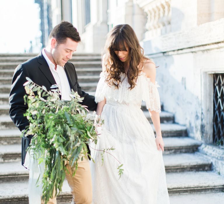 Bride-to-be in Katya Katya Shehurina Dress | Olive Branch Bouquet by Nina E I Fiori | Romantic Engagement Shoot at Villa Borghese Gardens, Rome by The Wedding Stylist | Cecelina Photography