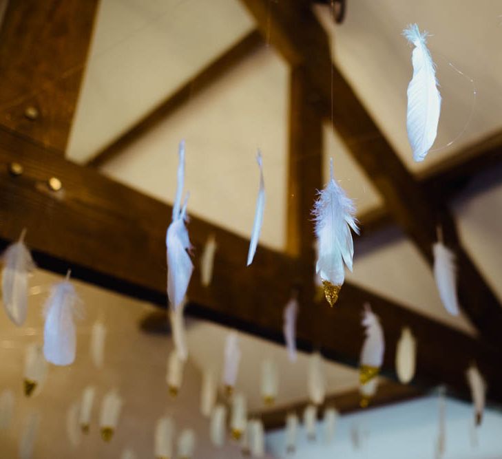 Feather Wedding Decor | Outdoor Wedding at Dewsall Court Oxfordshire | Claudia Rose Carter Photography | Costa Sister Productions