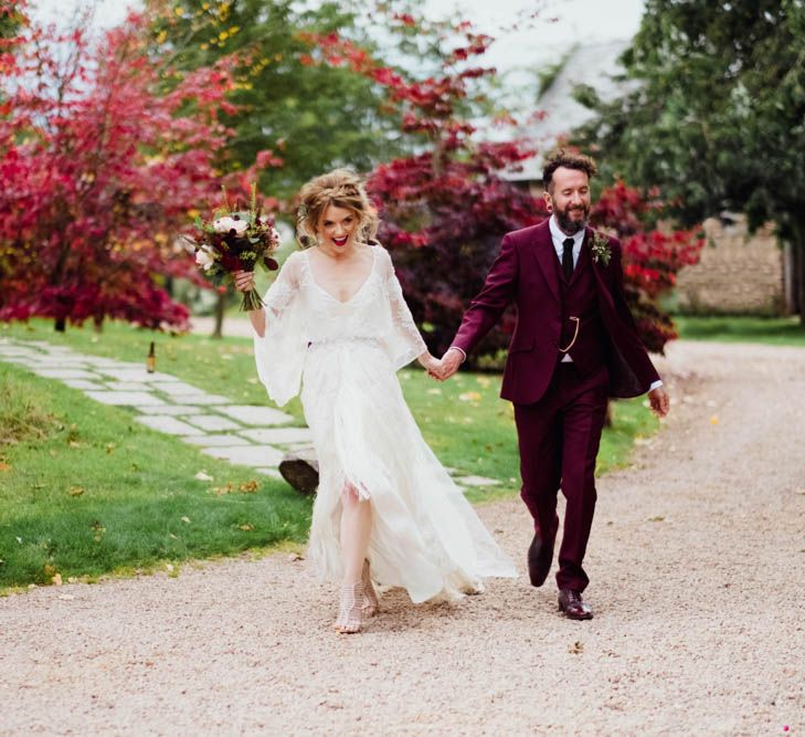 Bride in Rue de Seine Cleo Wedding Dress | Groom in Burgundy Suit | Outdoor Wedding at Dewsall Court Oxfordshire | Claudia Rose Carter Photography | Costa Sister Productions