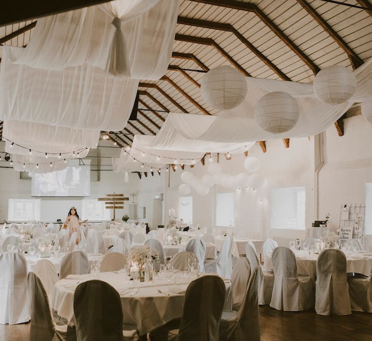 All White Decorated Barn with Hanging Paper Lanterns, Drapes & Flowers