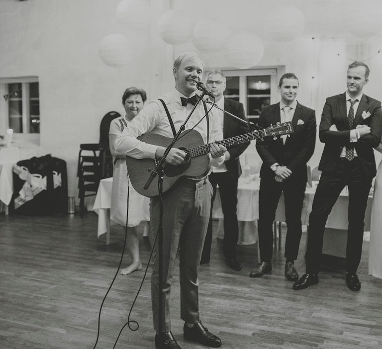 Groom Singing to his Bride