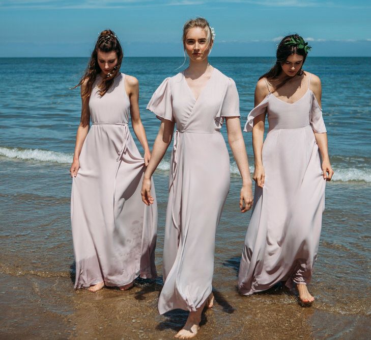 <a href="https://wearerewritten.com/" target="_blank">Rewritten</a> Bridesmaids Dresses In Oyster