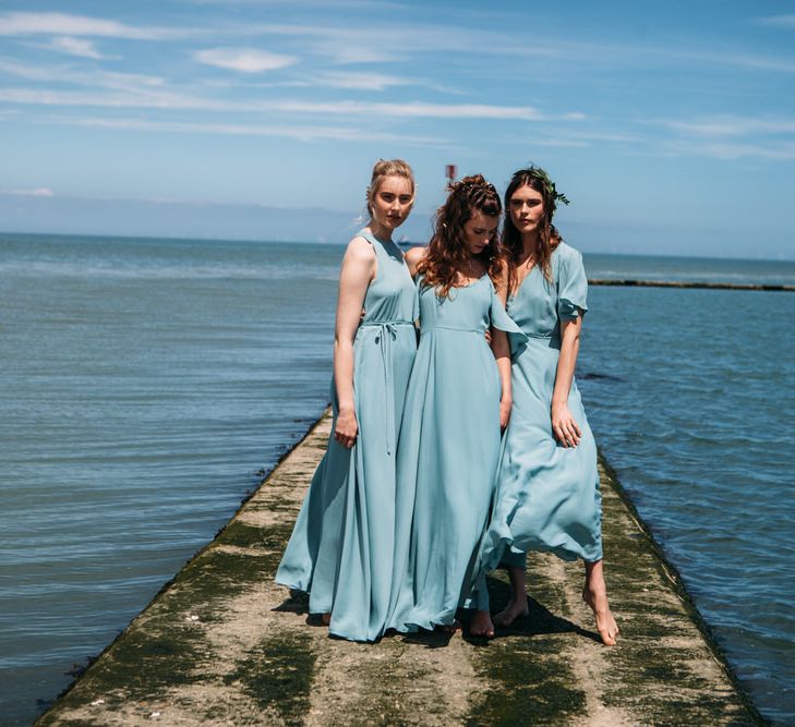 <a href="https://wearerewritten.com/" target="_blank">Rewritten</a> Bridesmaids Dresses In Marine