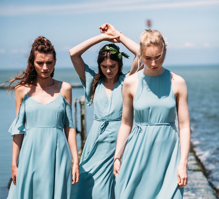 <a href="https://wearerewritten.com/" target="_blank">Rewritten</a> Bridesmaids Dresses In Marine