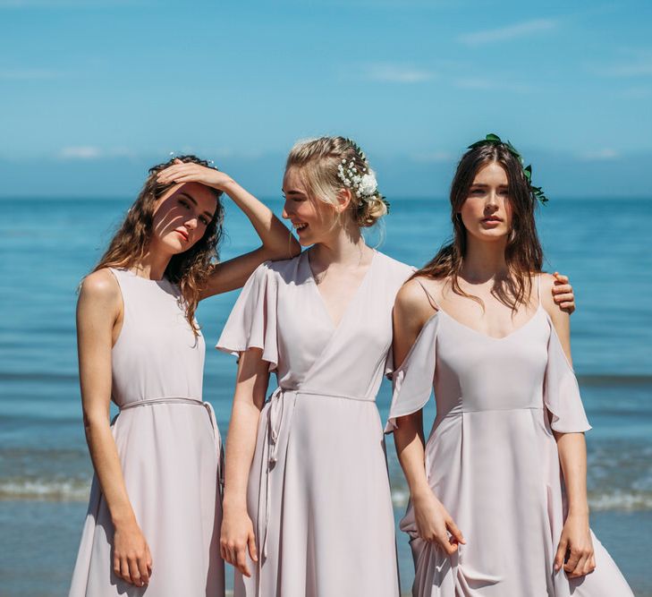 <a href="https://wearerewritten.com/" target="_blank">Rewritten</a> Bridesmaids Dresses In Oyster