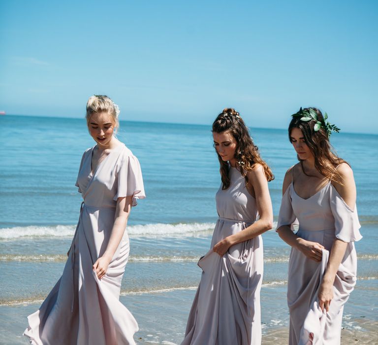 <a href="https://wearerewritten.com/" target="_blank">Rewritten</a> Bridesmaids Dresses In Oyster