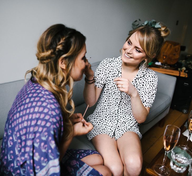 Delphine Manivet Bride With Bridesmaids In Reformation & Stylish London Wedding At Town Hall Hotel With Groom In Light Green & Images By Chris Barber