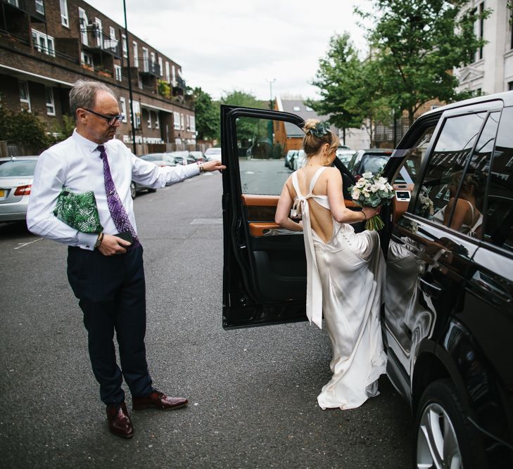 Delphine Manivet Bride With Bridesmaids In Reformation & Stylish London Wedding At Town Hall Hotel With Groom In Light Green & Images By Chris Barber