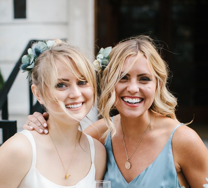 Delphine Manivet Bride With Bridesmaids In Reformation & Stylish London Wedding At Town Hall Hotel With Groom In Light Green & Images By Chris Barber