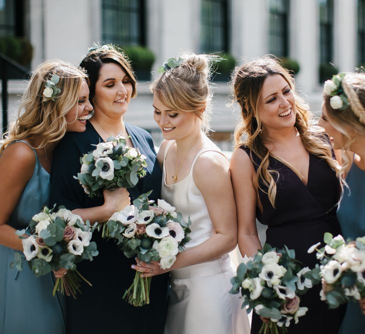 Delphine Manivet Bride With Bridesmaids In Reformation & Stylish London Wedding At Town Hall Hotel With Groom In Light Green & Images By Chris Barber