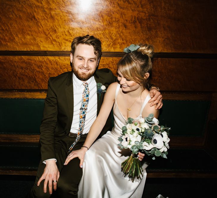 Delphine Manivet Bride With Bridesmaids In Reformation & Stylish London Wedding At Town Hall Hotel With Groom In Light Green & Images By Chris Barber