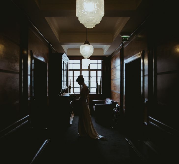 Delphine Manivet Bride With Bridesmaids In Reformation & Stylish London Wedding At Town Hall Hotel With Groom In Light Green & Images By Chris Barber