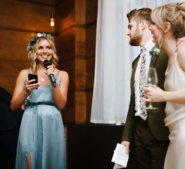 Delphine Manivet Bride With Bridesmaids In Reformation & Stylish London Wedding At Town Hall Hotel With Groom In Light Green & Images By Chris Barber