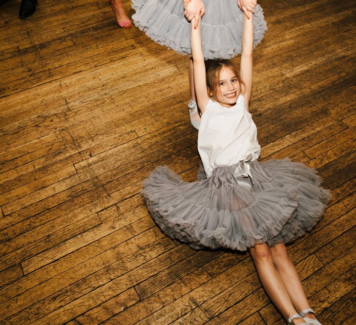 Delphine Manivet Bride With Bridesmaids In Reformation & Stylish London Wedding At Town Hall Hotel With Groom In Light Green & Images By Chris Barber