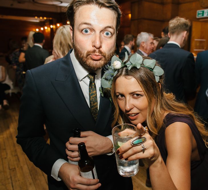 Delphine Manivet Bride With Bridesmaids In Reformation & Stylish London Wedding At Town Hall Hotel With Groom In Light Green & Images By Chris Barber