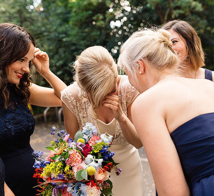 Bride in Catherine Deane Zaden Gown & Bright Bouquet