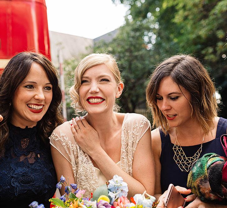 Bride in Catherine Deane Zaden Gown & Bright Bouquet