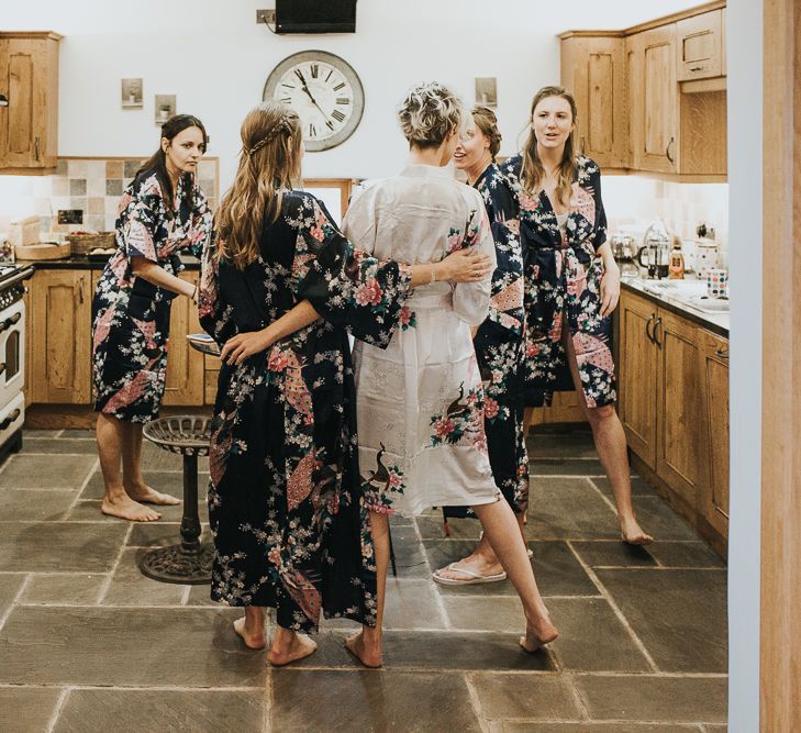 Bridesmaids In Floral Robes On Morning Of Wedding