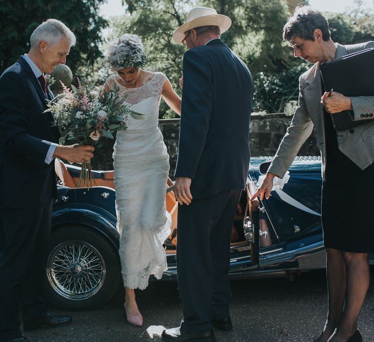 Stylish Usk Castle Wedding With Bride In Flower Crown With Pixie Crop & Bridesmaids In Tonal Blue Lace Dresses With Images From Magda K Photography