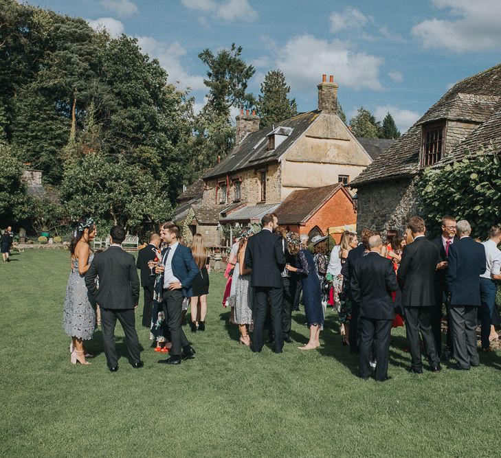 Stylish Usk Castle Wedding With Bride In Flower Crown With Pixie Crop & Bridesmaids In Tonal Blue Lace Dresses With Images From Magda K Photography