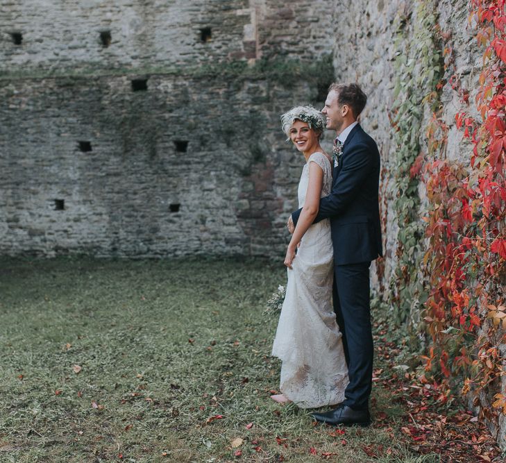 Stylish Usk Castle Wedding With Bride In Flower Crown With Pixie Crop & Bridesmaids In Tonal Blue Lace Dresses With Images From Magda K Photography