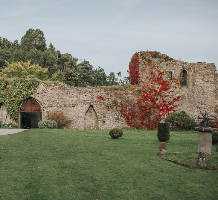 Stylish Usk Castle Wedding With Bride In Flower Crown With Pixie Crop & Bridesmaids In Tonal Blue Lace Dresses With Images From Magda K Photography