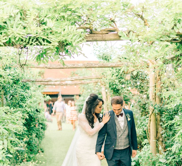 Gorgeous Handmade Pastel Rustic Tipi Wedding At The Gardens Yalding With Bride In Long Sleeved Lace Gown & Images From Sarah Jane Ethan Photography