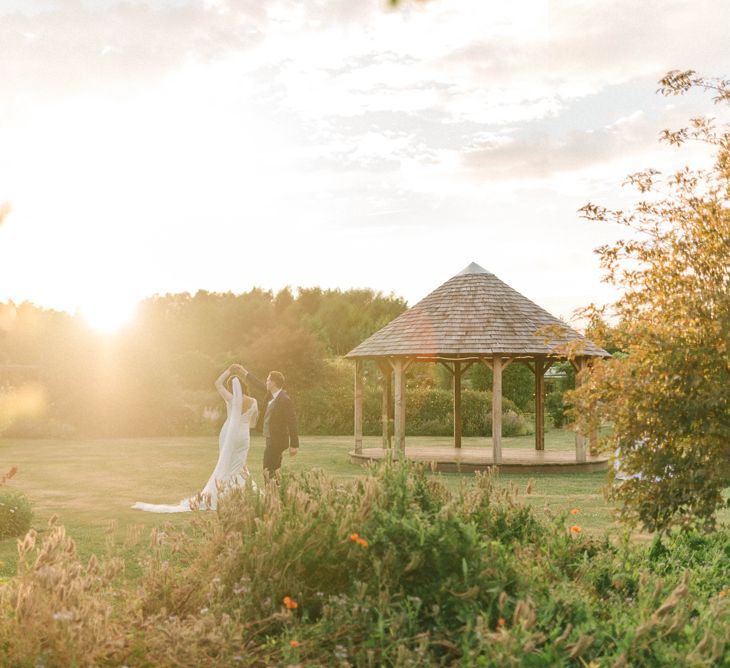 Gorgeous Handmade Pastel Rustic Tipi Wedding At The Gardens Yalding With Bride In Long Sleeved Lace Gown & Images From Sarah Jane Ethan Photography