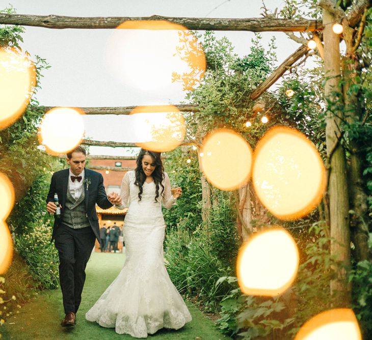 Gorgeous Handmade Pastel Rustic Tipi Wedding At The Gardens Yalding With Bride In Long Sleeved Lace Gown & Images From Sarah Jane Ethan Photography