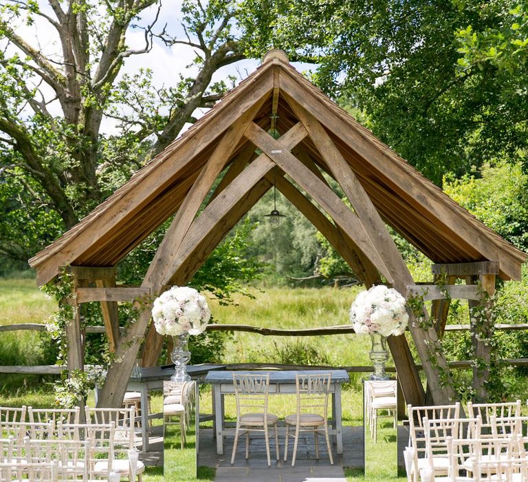 Outdoor Ceremony at Millbridge Court, Surrey | White Hydrangea Flowers | Anneli Marinovich Photography