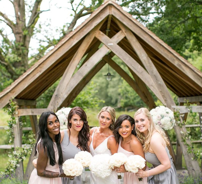 Bridesmaids in Pastel Vera Wang Dresses | Bride in Anita Massarella Bridal Gown | Anneli Marinovich Photography