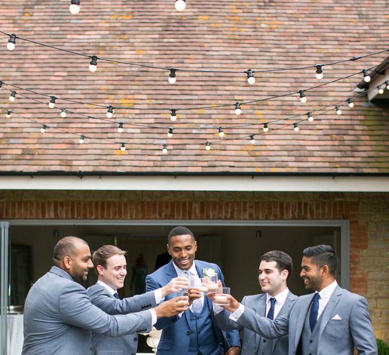 Groom in Cad and The Dandy | Groomsmen in Moss Bros. Suits | Anneli Marinovich Photography