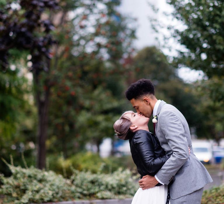 Bride in Bespoke Tea Length Wedding Dress | Groom in Grey Jaeger Suit | 60s Inspired London Pub Wedding | The Peasant | Babb Photo