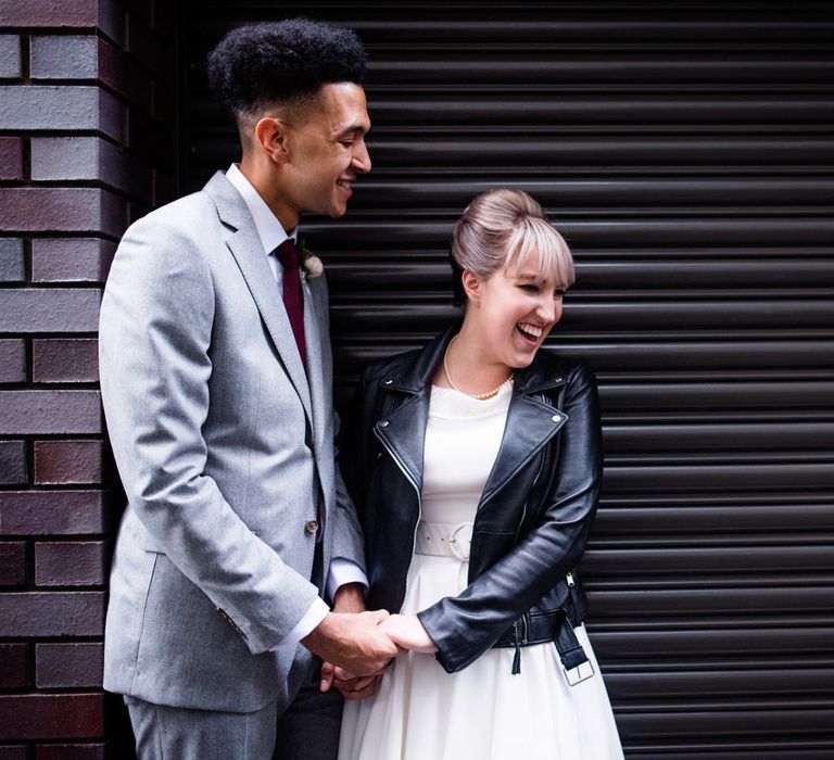 Bride in Bespoke Tea Length Wedding Dress | Groom in Grey Jaeger Suit | 60s Inspired London Pub Wedding | The Peasant | Babb Photo