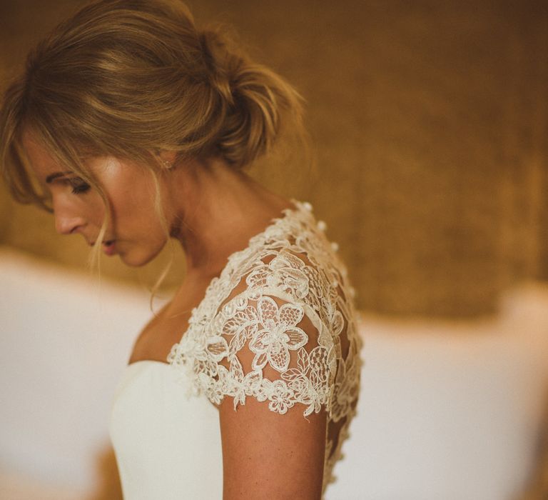 Bride in Lace Cap Sleeves Sassi Holford Bridal Gown