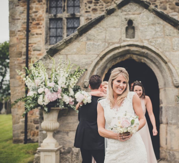 Bride in Lace Sottero and Midgley Quinlynn Wedding Dress