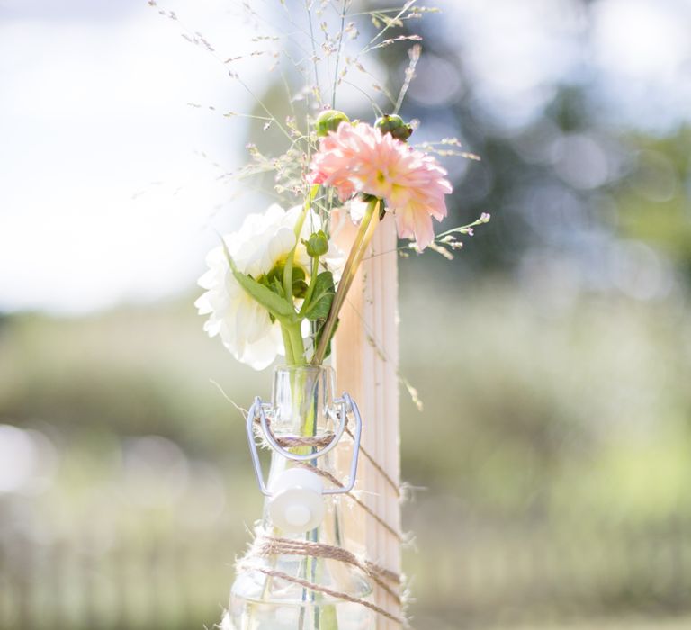 Hanging Bottles With Florals