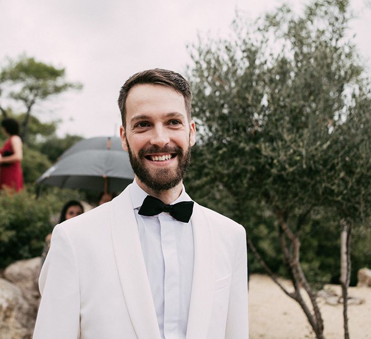 Groom in Tailor Made Tom Black Suit | Stylish Outdoor Wedding at Masia Casa del Mar in Barcelona, Spain | Sara Lobla Photography | Made in Video Film