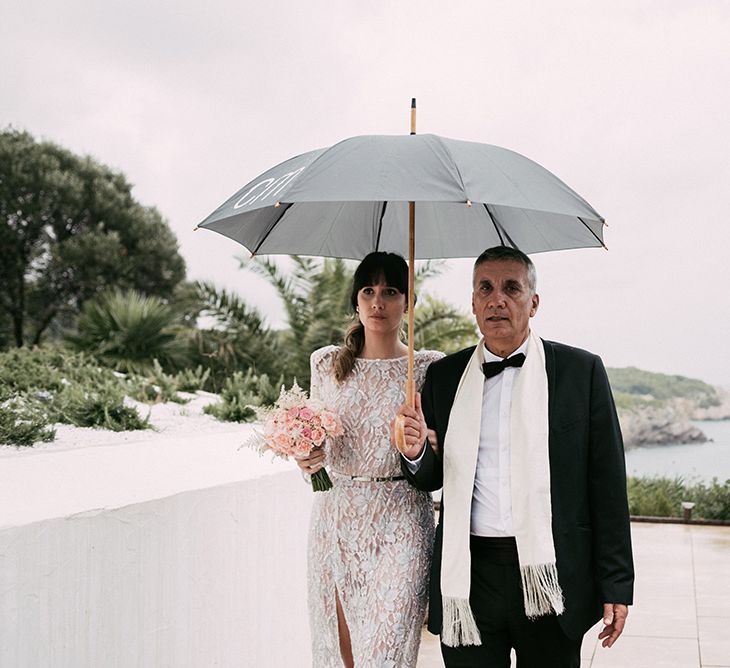 Bride in Embellished Ze García Bridal Gown with Front Split | Stylish Outdoor Wedding at Masia Casa del Mar in Barcelona, Spain | Sara Lobla Photography | Made in Video Film